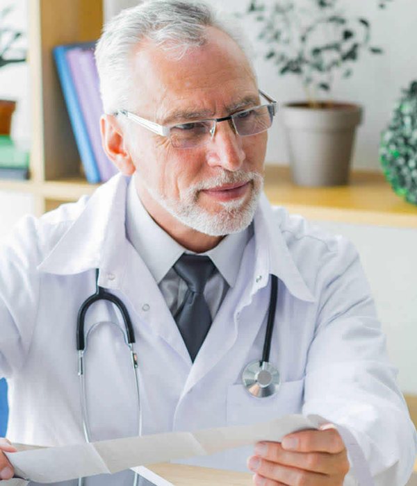 Doctor talking with a patient in a bright clinic